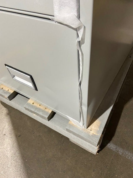 Dent on front right edge and bottom drawer